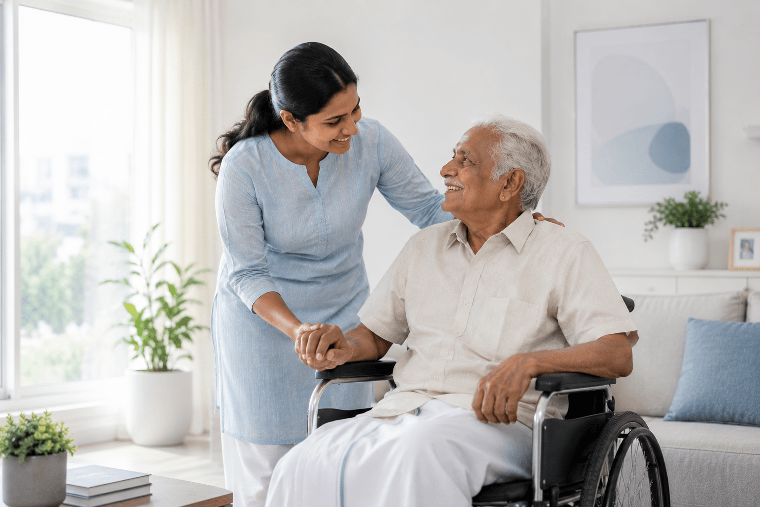 A nurse smiling with an elderly patient at home